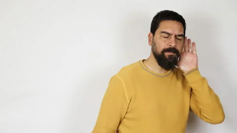Handsome man with beard try to listening a gossip, showing stop gesture. Stock Footage 165806421