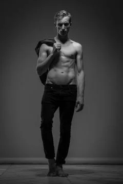 Handsome Man In Black Jeans Stock Photos