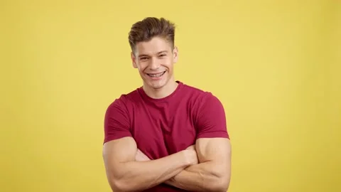 Handsome man with brackets smiling at camera 動画素材 234913089