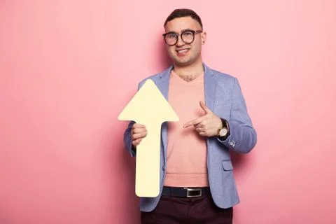 Handsome man in bright jacket with speech pointer Stock Photos