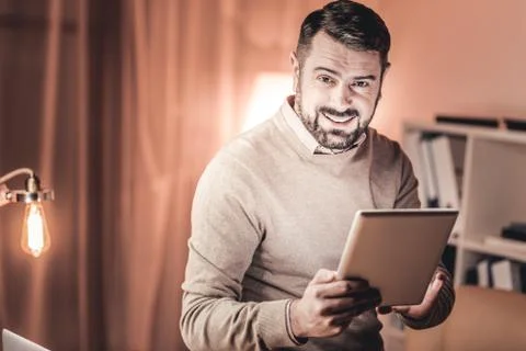 Handsome man checking emails Stock Photos