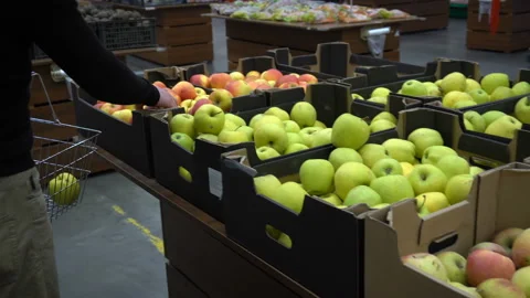 Handsome Man is Choosing Apple Cider in the Supermarket. Stock Footage 89584695