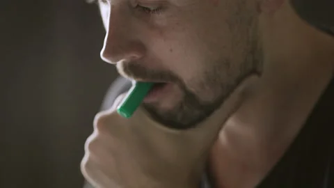 Handsome man close up thinking about something and writing Stock-Footage 152539992