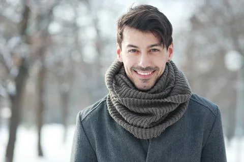 Handsome man in coat Stock Photos