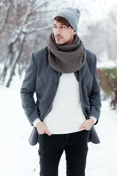 Handsome man in coat Stock Photos