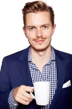 Handsome man with coffee looking at camera Stock Photos