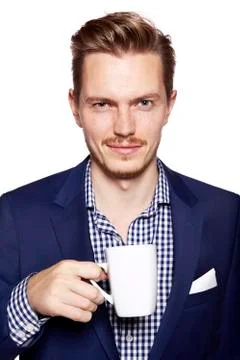 Handsome man with coffee looking at camera Foto stock