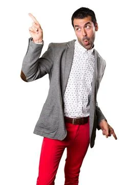 Handsome man dancing on isolated background Stock Photos