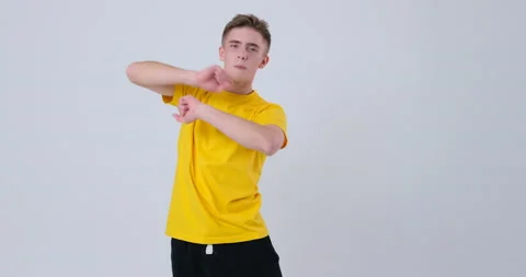 Handsome Man dancing over white background Stock Footage 144959191