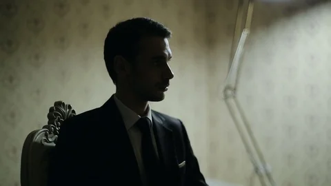 Handsome man in the dark 스톡 동영상 83390740