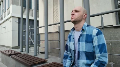 Handsome man dreams or thinks about solving problems Stockbeeldmateriaal 201635982