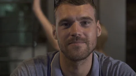 Handsome man drinking beer from mug in pub bar close up. Portrait young man Stock Footage 104387118