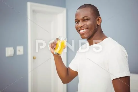 Handsome Man Drinking Orange Juice Stock Images Page Everypixel