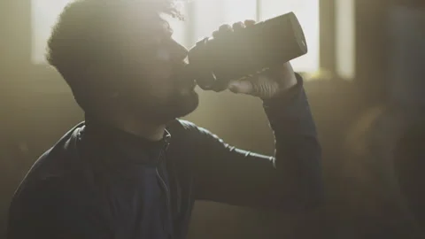 Handsome man drinking water Stock Footage 236192077