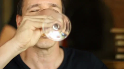 Handsome man drinking white wine in a gourmet restaurant 39641721