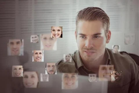 Handsome man encircled by digital interface Stock Photos