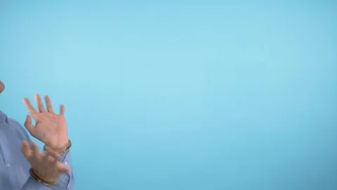 Handsome man freak dancing happily. blue background Stock Footage 122390769