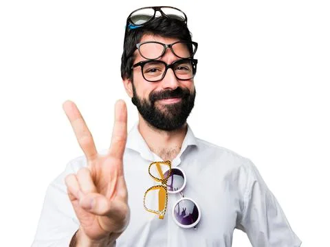Handsome man with glasses counting two Stock Photos