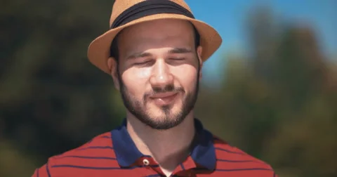 Handsome man with hat smiling to the camera 스톡 동영상 59541327