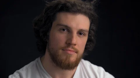 Handsome man with indifference on his face Stock Footage 127803391
