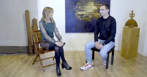 Handsome man interview in studio Stock Footage 148940577