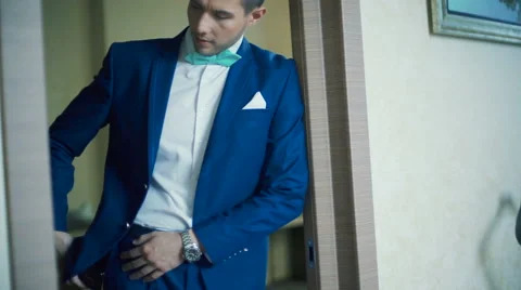 Handsome man in jacket talking on the phone Video stock 62828858