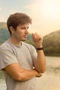 Handsome man at the lake Stock Photos