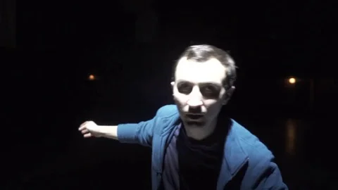 Handsome man in light strobe Stock Footage 77365310