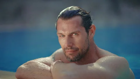 Handsome Man Looking at Camera Stock Footage 302077208