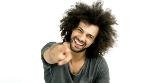 Handsome man looking smiling pointing finger Stock Footage 37817657