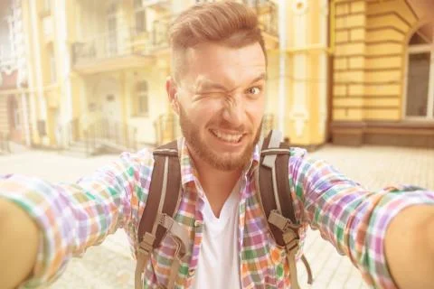 Handsome man making selfies Stock Photos