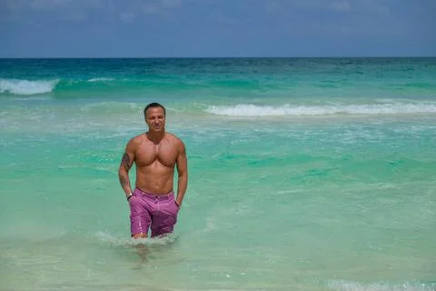 Handsome Man in Ocean Foto stock