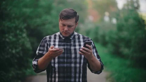 Handsome Man Online Banking Using Smartphone Shopping Online Using Credit Card Stock Footage 152256420