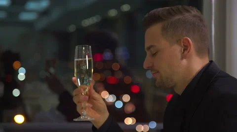 Handsome man over night city background is waiting for somebody Stock Footage 60055971