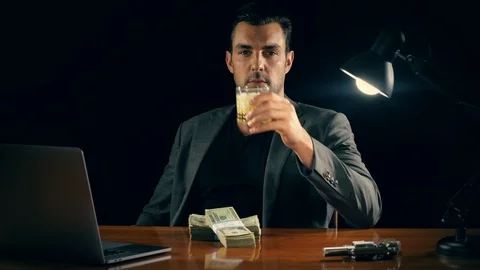 Handsome man plays with a stack of cash Stockbeeldmateriaal 111603293