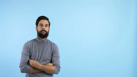 Handsome man pointing at copy space  Stockbeeldmateriaal 86896851