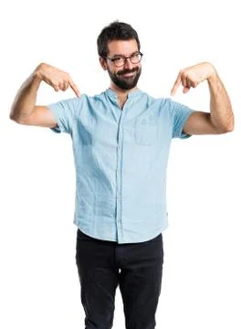 Handsome man pointing down Stock Photos