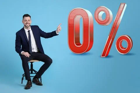 Handsome man pointing at sign Zero Percent on light blue background. Special  Foto stock