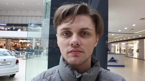 Handsome man portrait at the mall Видео 123725054