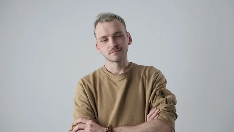 Handsome man posing over white background Stock Footage 105188949