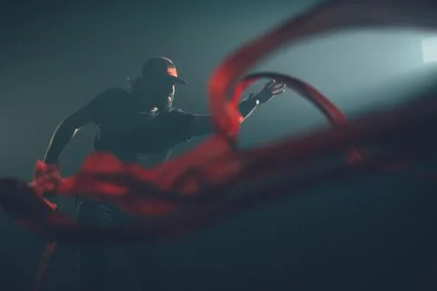 Handsome man posing in studio in backlight. 写真素材