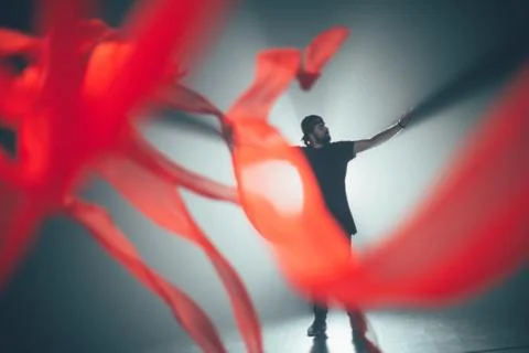 Handsome man posing in studio in backlight. Foto stock