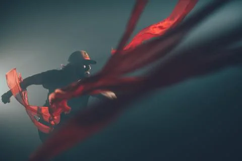 Handsome man posing in studio in backlight. Stock Photos