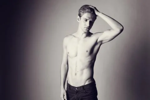 Handsome man posing in the studio Stock Photos