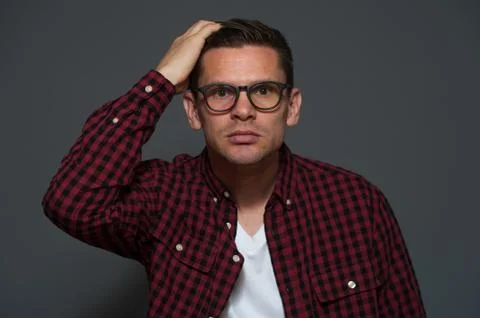 Handsome man posing in studio Stock Photos