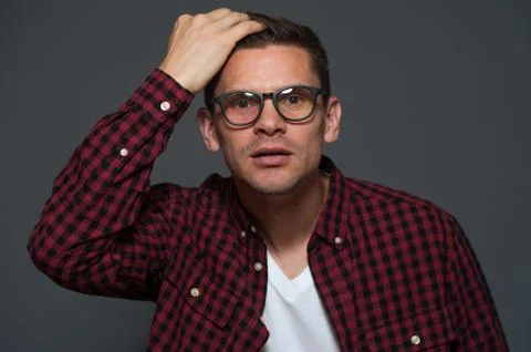 Handsome man posing in studio Stock Photos