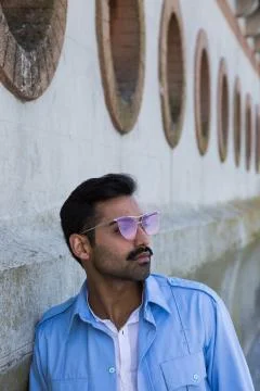 Handsome man posing in an urban context Stock Photos