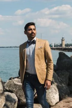 Handsome man posing in a vacation context Stock Photos