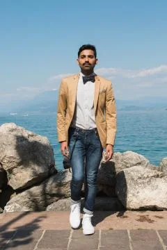 Handsome man posing in a vacation context Stock Photos