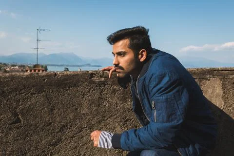 Handsome man posing in a vacation context Stock Photos